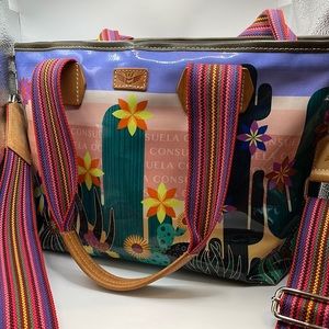 Super popular Consuela hand bag with extra guitar strap. This bag is cute cute!